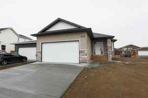 Just listed Riverstone Homes for sale 509 Riverhills Way W in Riverstone Lethbridge 