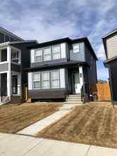 Just listed Belmont Homes for sale 164 Belmont Villas SW in Belmont Calgary 