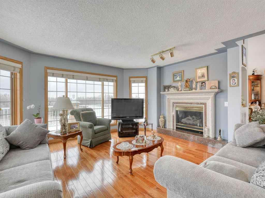MLS® A1109040 - 254209 Woodland Road  in Bearspaw_Calg Rural Rocky View County, Residential