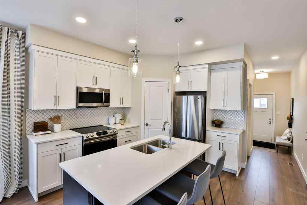 MLS® A2061856 - Unit #3 14 Riverford Close W in Riverstone Lethbridge, Residential