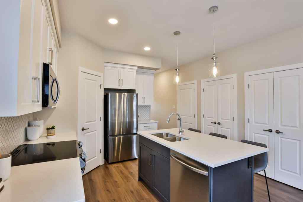 MLS® A2061856 - Unit #3 14 Riverford Close W in Riverstone Lethbridge, Residential