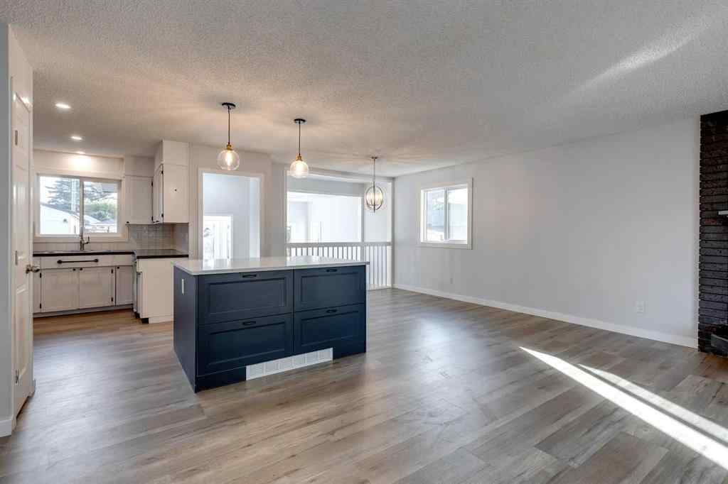 MLS® A2081808 1424 Lake Ontario Drive SE Calgary, Alberta, T2J 3G6