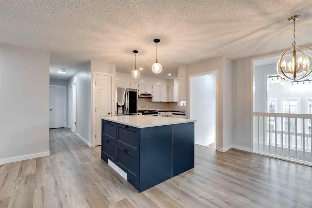 MLS® A2081808 1424 Lake Ontario Drive SE Calgary, Alberta, T2J 3G6