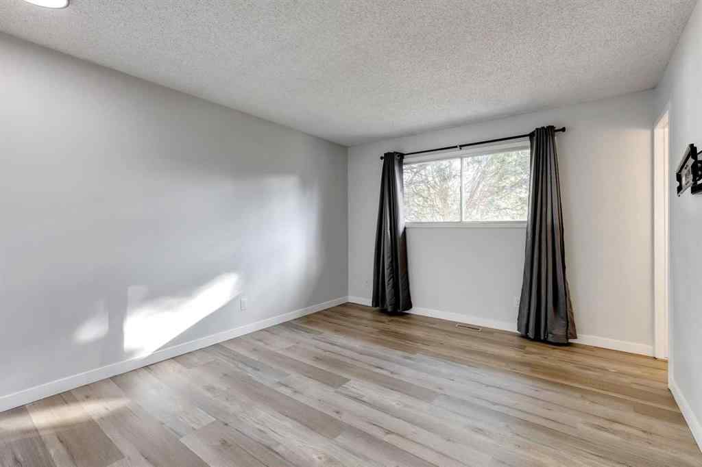 MLS® A2081808 1424 Lake Ontario Drive SE Calgary, Alberta, T2J 3G6