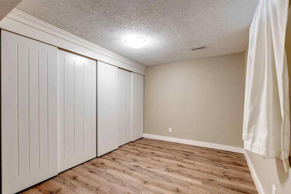 MLS® A2081808 1424 Lake Ontario Drive SE Calgary, Alberta, T2J 3G6