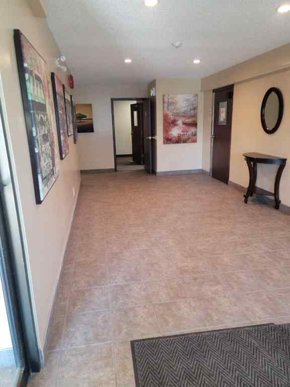 MLS® A2084617 - Unit #209 1712 38 Street SE in Forest Lawn Calgary, Residential