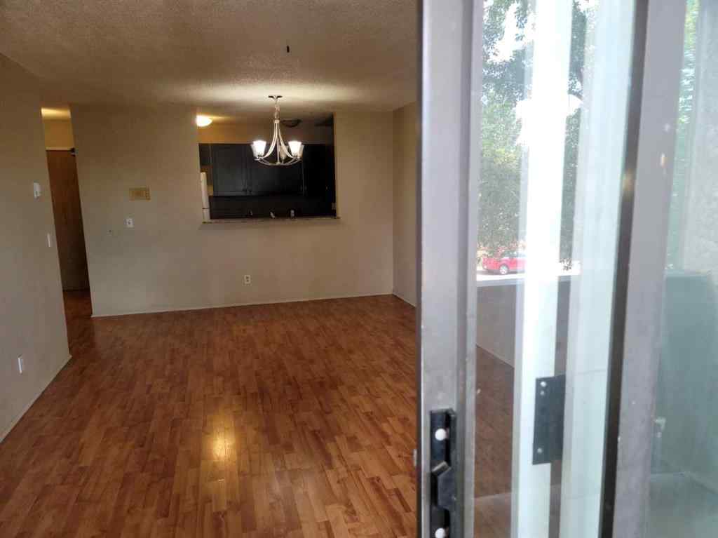 MLS® A2084617 - Unit #209 1712 38 Street SE in Forest Lawn Calgary, Residential