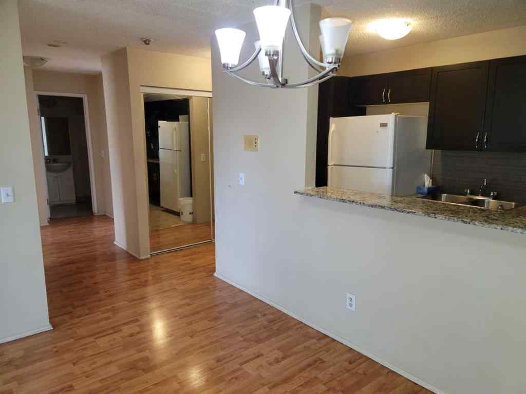 MLS® A2084617 - Unit #209 1712 38 Street SE in Forest Lawn Calgary, Residential