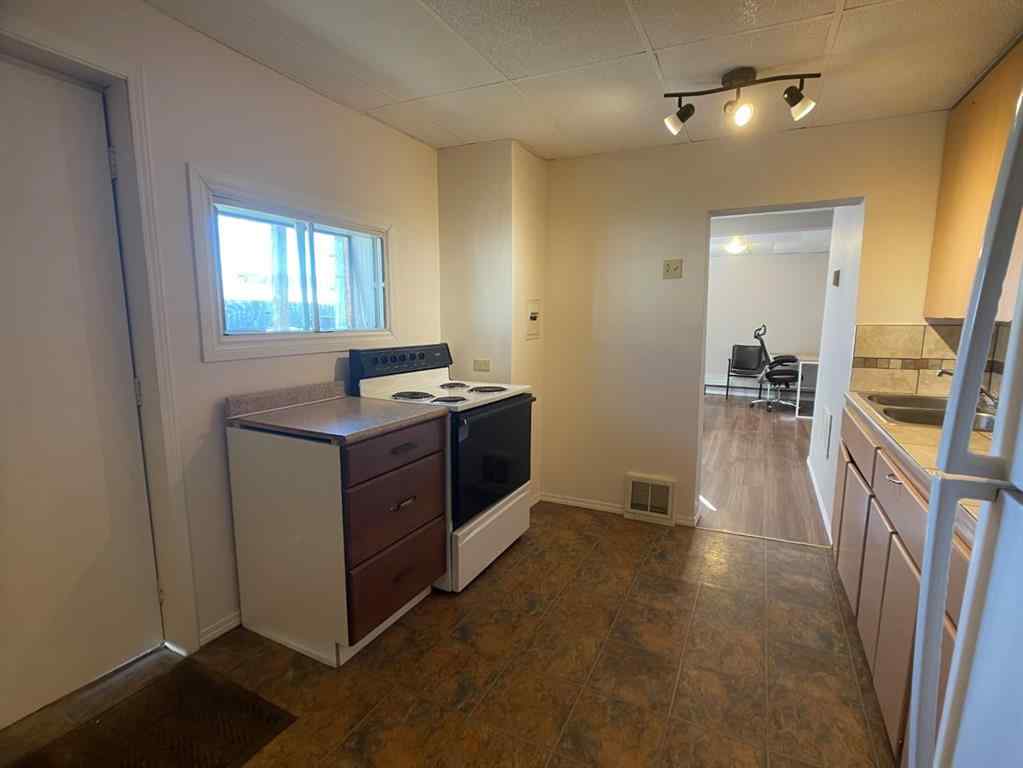 MLS® A2105064 - Unit #1-6 5109 50th Street   in NONE High Prairie, Multi-Family