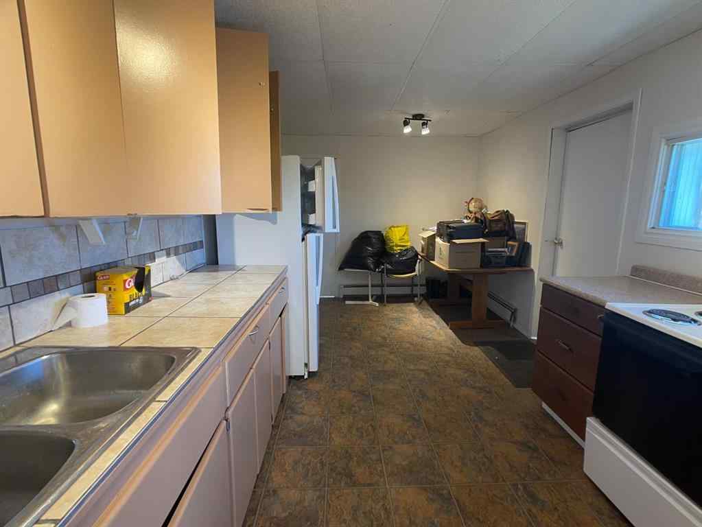 MLS® A2105064 - Unit #1-6 5109 50th Street   in NONE High Prairie, Multi-Family