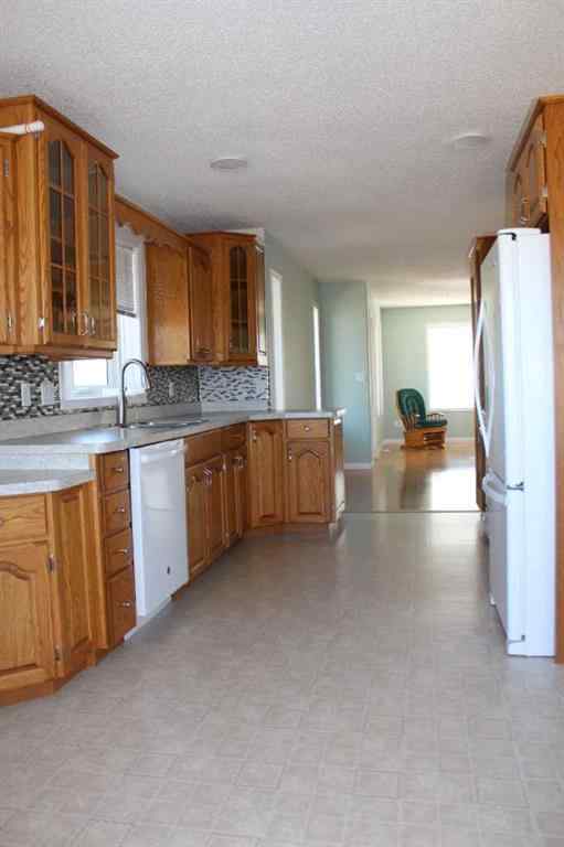 MLS® A2129998 - 503 5th Avenue  NE in NONE Manning, Residential
