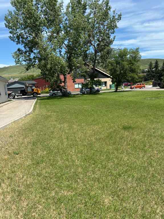 MLS® A2150001 - 313 FIRST Street E in East End Cochrane, Commercial