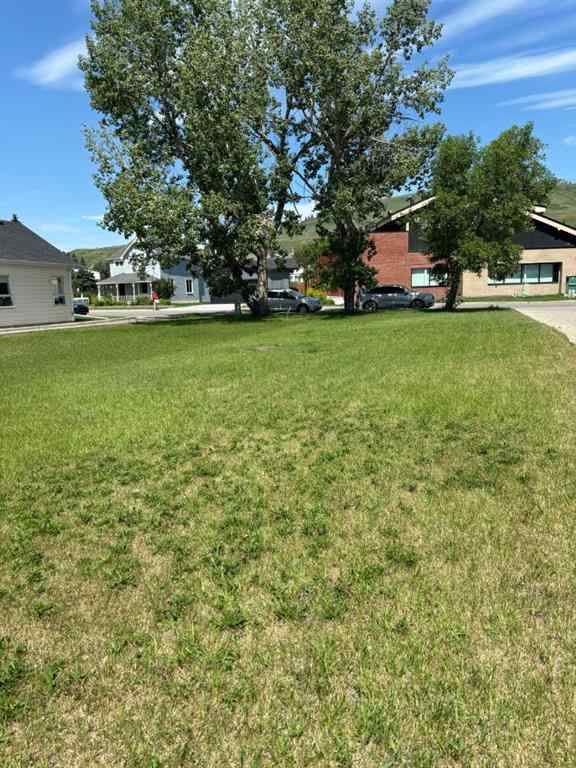 MLS® A2150001 - 313 FIRST Street E in East End Cochrane, Commercial