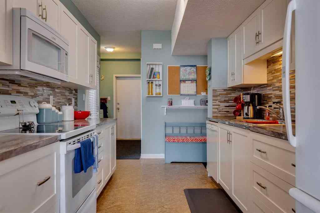 MLS® A2150026 - 102 Railway Avenue E in NONE Carseland, Residential