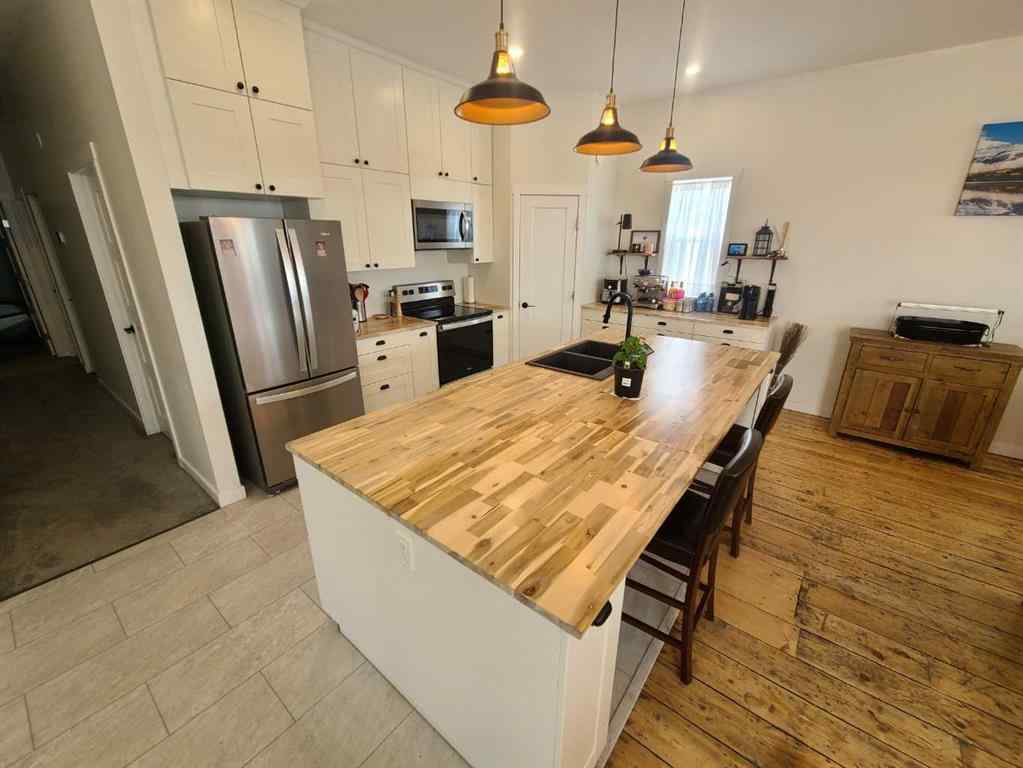MLS® A2150708 - 10006 100 Street  in Northern Sunrise County Nampa, Residential