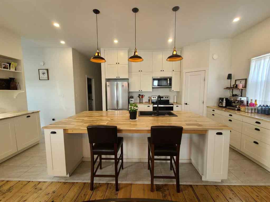 MLS® A2150708 - 10006 100 Street  in Northern Sunrise County Nampa, Residential