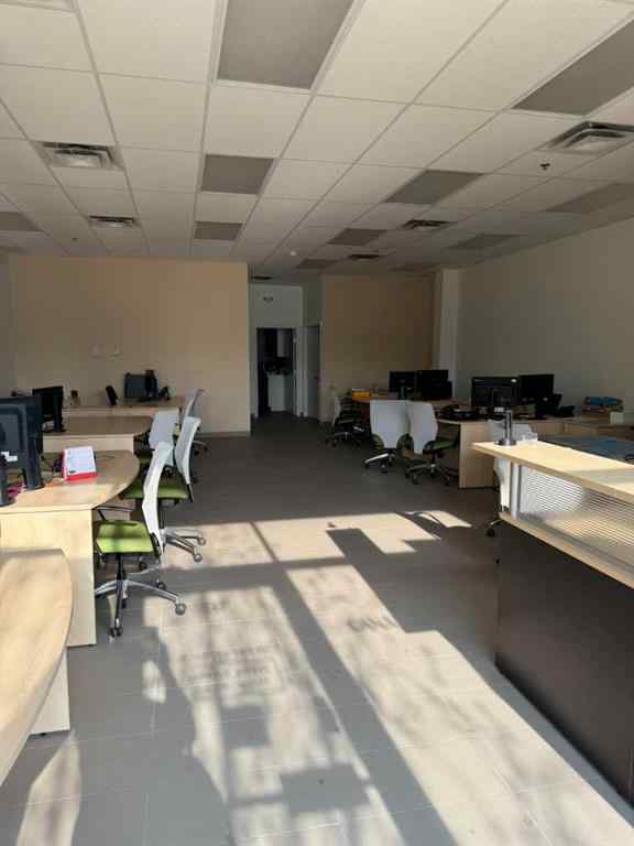 MLS® A2153607 - Unit #107 2308 Centre Street NE in Tuxedo Park Calgary, Commercial