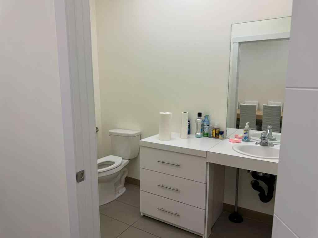 MLS® A2153607 - Unit #107 2308 Centre Street NE in Tuxedo Park Calgary, Commercial