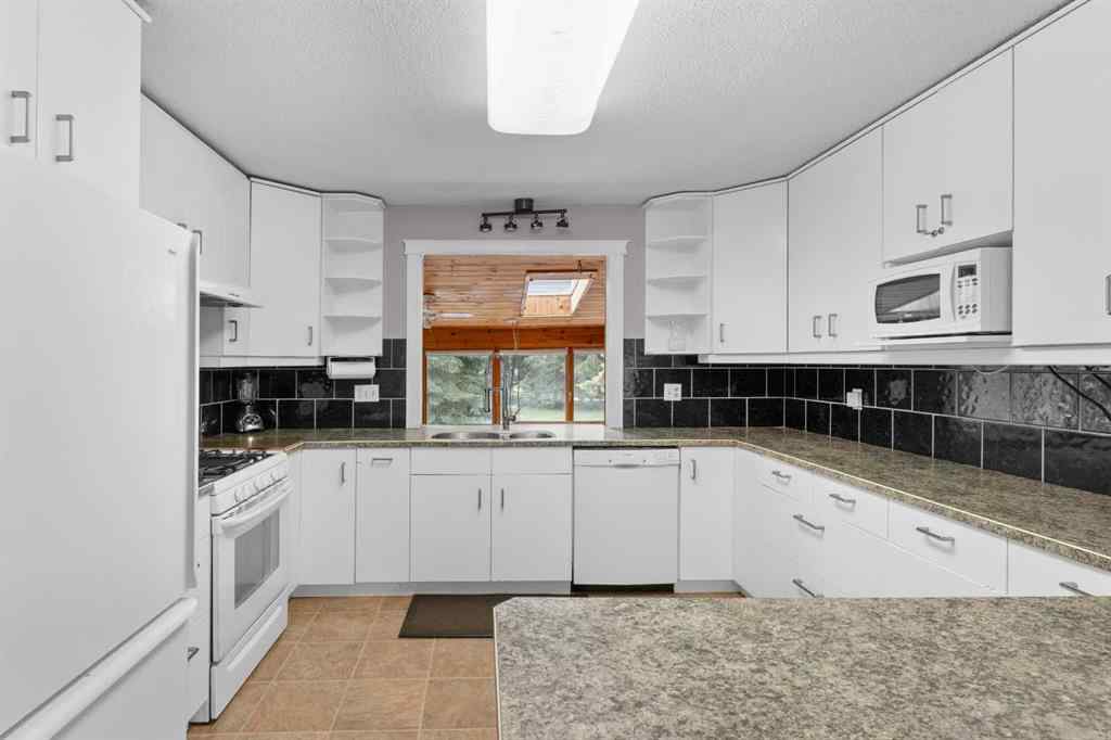 MLS® A2153842 - 102-4042 Highway 587   in Garrington Acres Rural Red Deer County, Residential