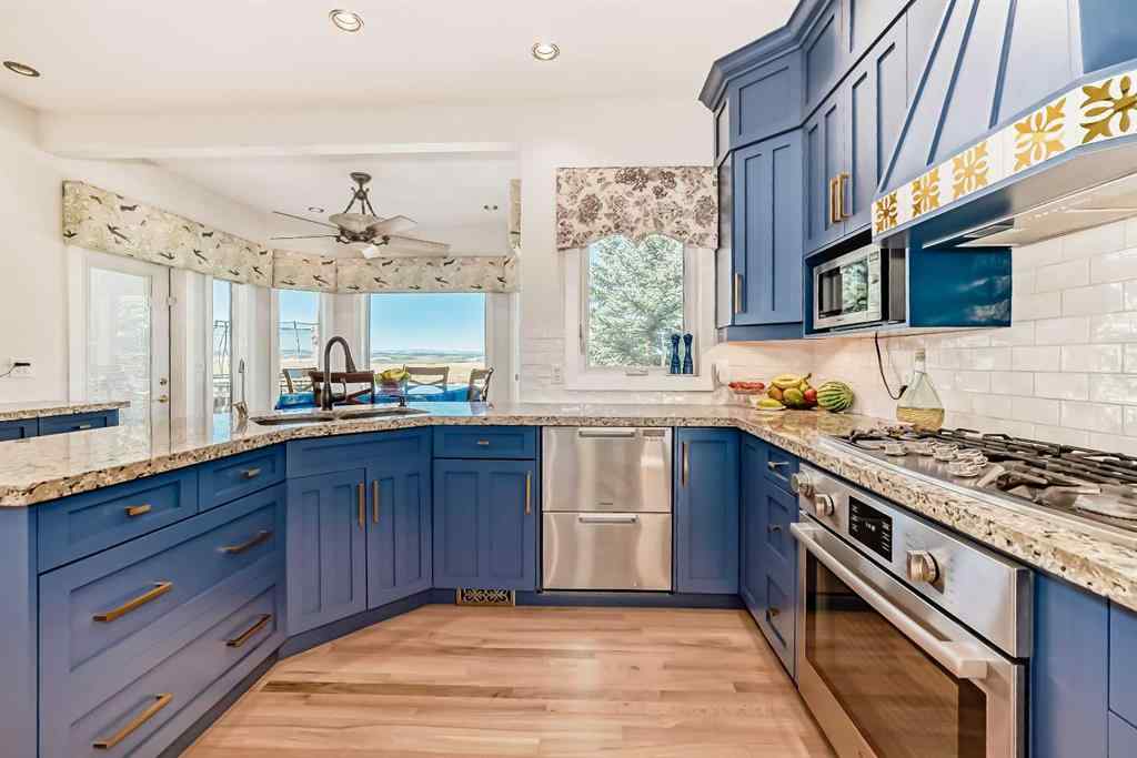 MLS® A2166368 - 226235 22 Street W in Ridgemont Estates Rural Foothills County, Residential
