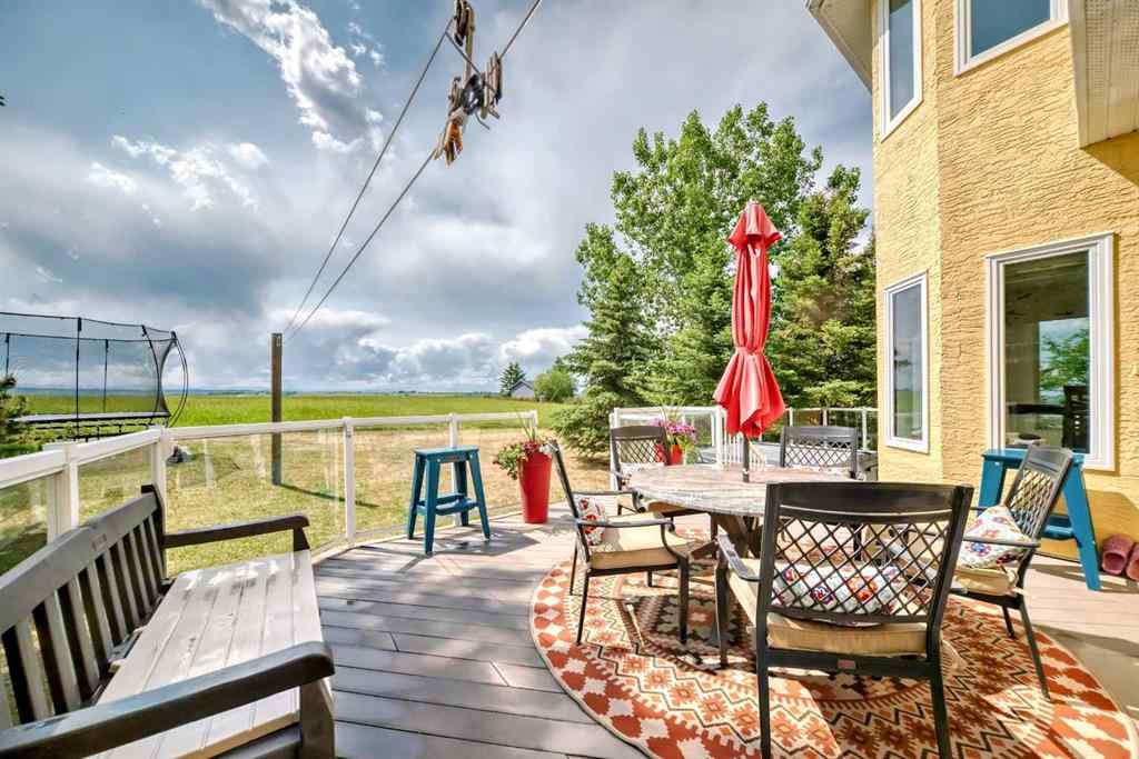 MLS® A2166368 - 226235 22 Street W in Ridgemont Estates Rural Foothills County, Residential