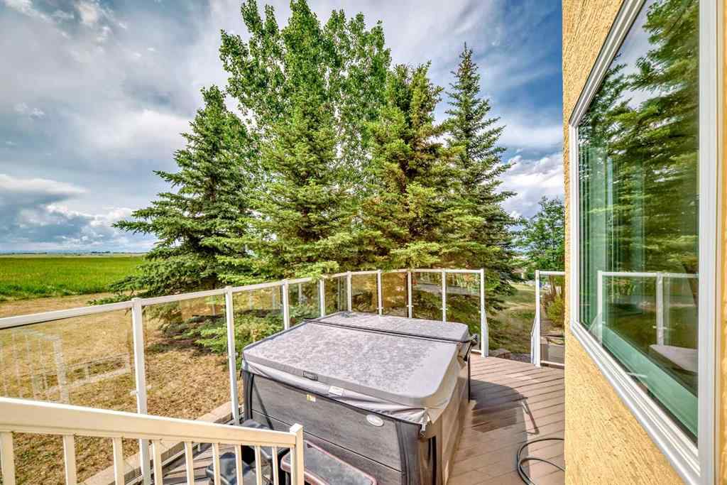 MLS® A2166368 - 226235 22 Street W in Ridgemont Estates Rural Foothills County, Residential