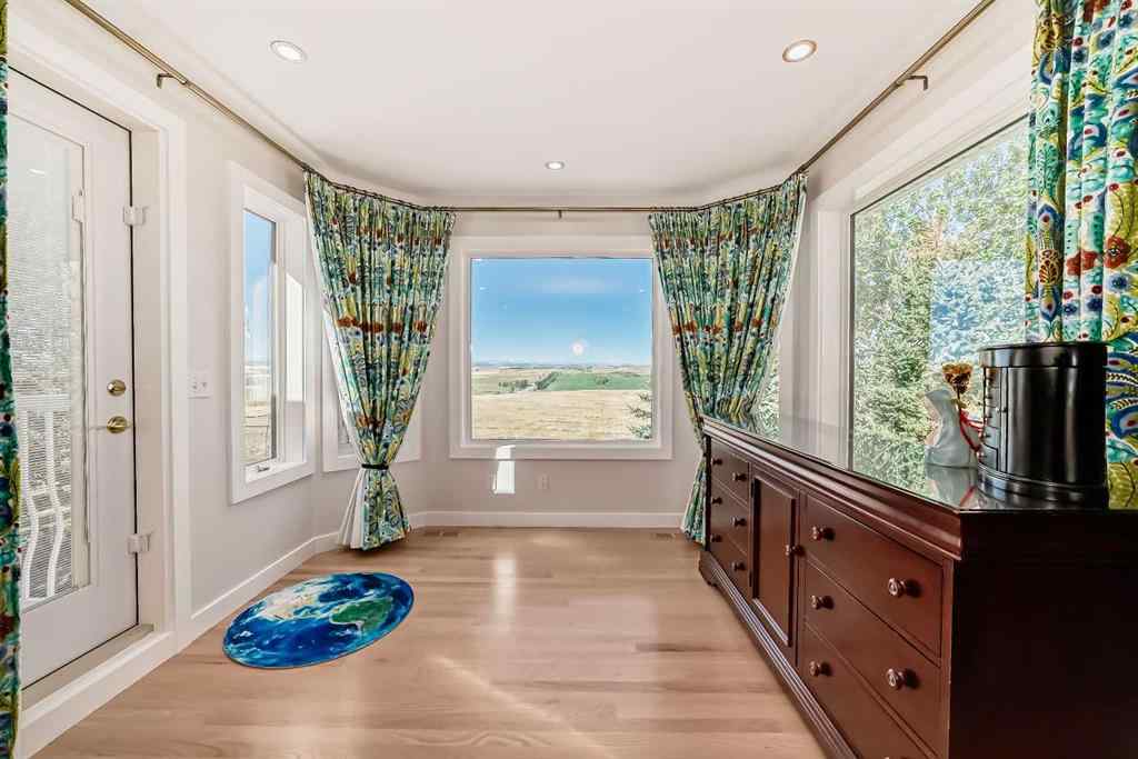 MLS® A2166368 - 226235 22 Street W in Ridgemont Estates Rural Foothills County, Residential