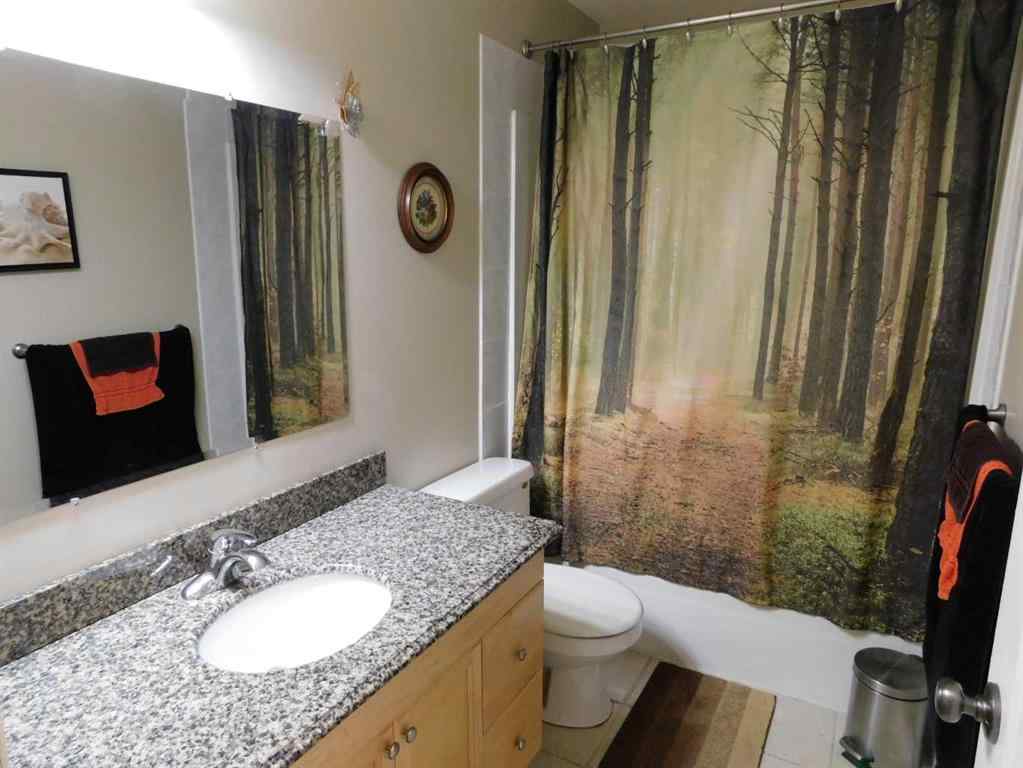 MLS® A2171296 - 87 Greystone Close E in Greystone Brooks, Residential