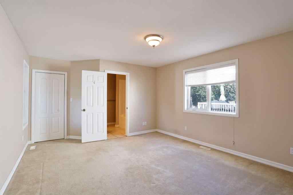 MLS® A2171296 - 87 Greystone Close E in Greystone Brooks, Residential