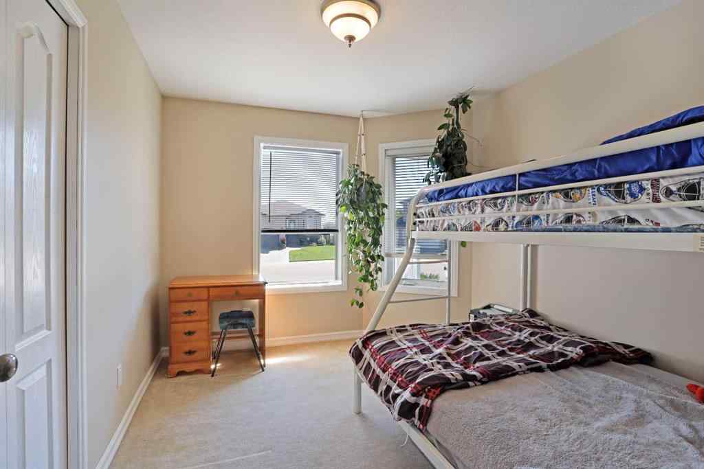 MLS® A2171296 - 87 Greystone Close E in Greystone Brooks, Residential