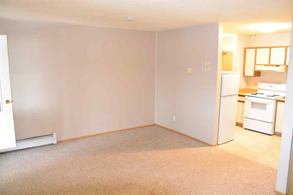 MLS® A2172417 - Unit #101-215 10118 100 Avenue  in Downtown Peace River, Multi-Family