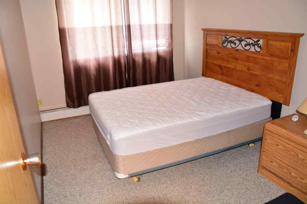 MLS® A2172417 - Unit #101-215 10118 100 Avenue  in Downtown Peace River, Multi-Family