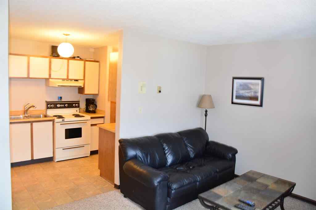 MLS® A2172417 - Unit #101-215 10118 100 Avenue  in Downtown Peace River, Multi-Family