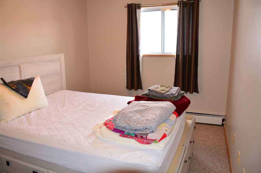 MLS® A2172417 - Unit #101-215 10118 100 Avenue  in Downtown Peace River, Multi-Family