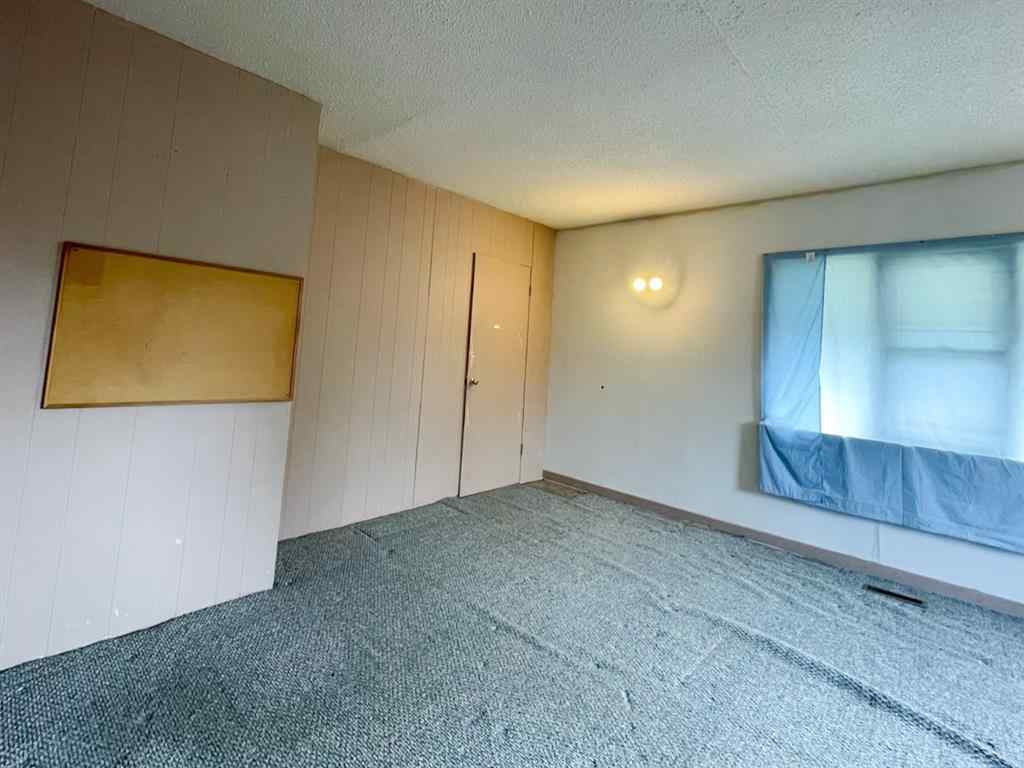 MLS® A2176577 - 1037 8 Avenue  in Wainwright Wainwright, Residential