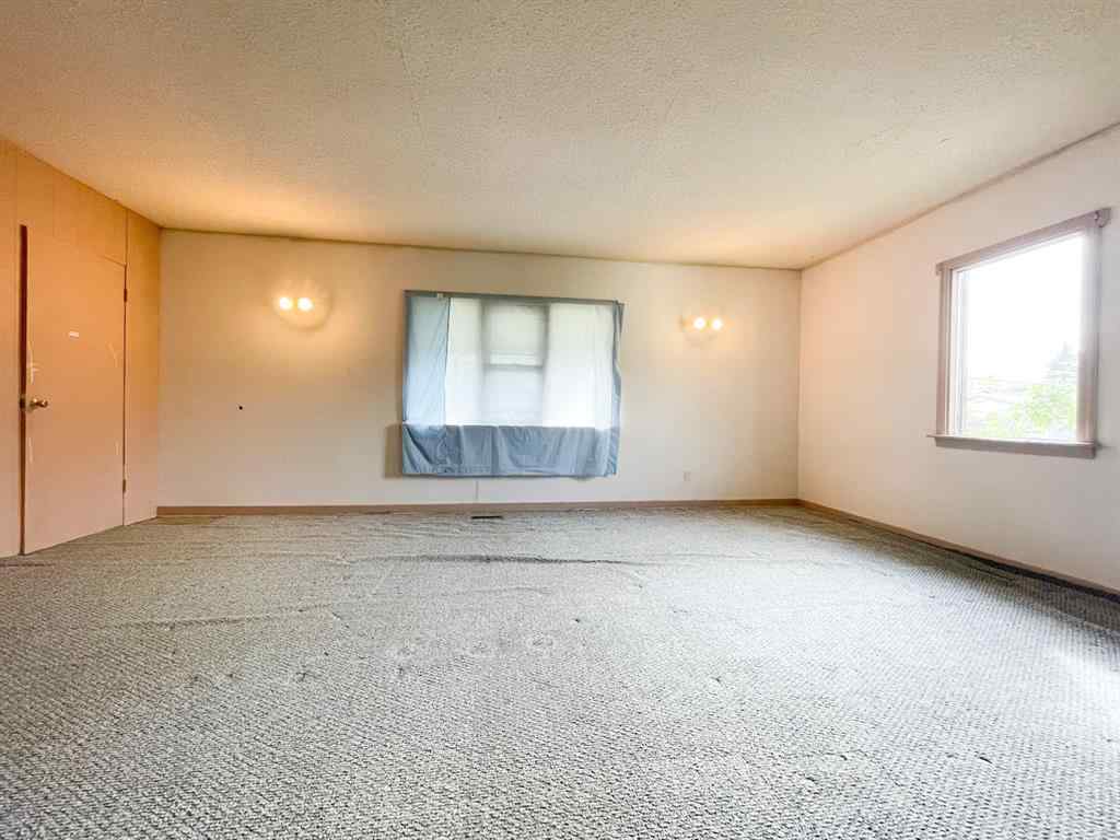 MLS® A2176577 - 1037 8 Avenue  in Wainwright Wainwright, Residential