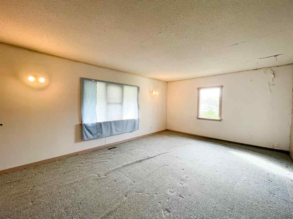 MLS® A2176577 - 1037 8 Avenue  in Wainwright Wainwright, Residential