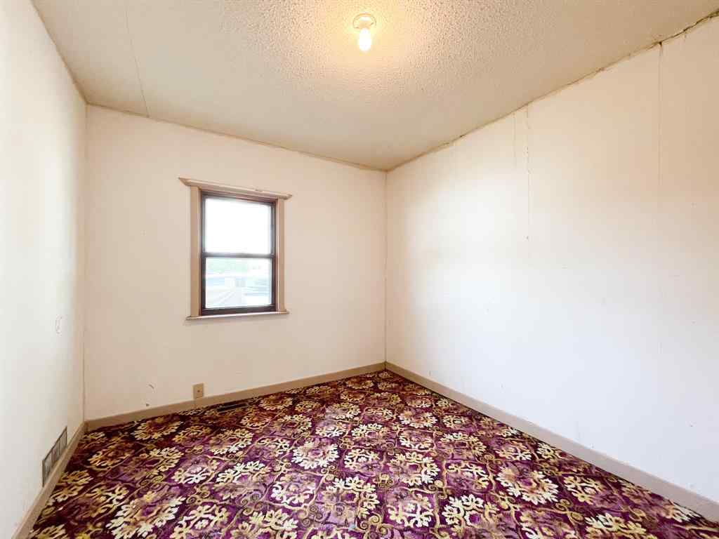 MLS® A2176577 - 1037 8 Avenue  in Wainwright Wainwright, Residential