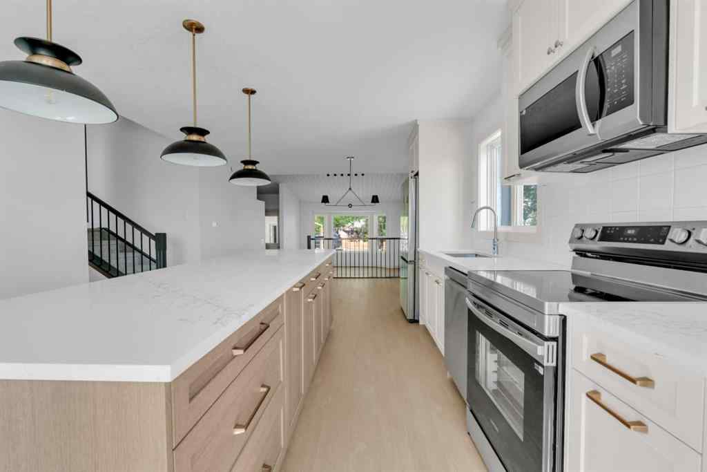 MLS® A2178920 - 56 Macewan Meadow Way NW in MacEwan Glen Calgary, Residential