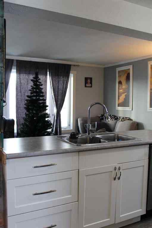 MLS® A2179481 - 409 2nd Street NE in NONE Manning, Residential