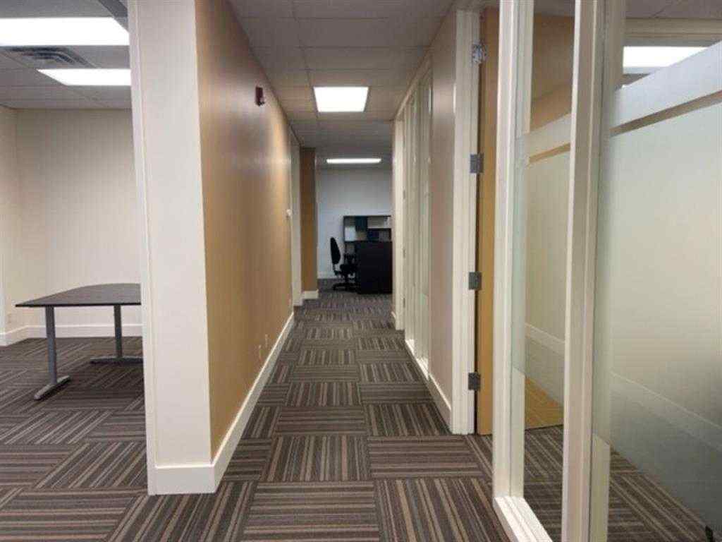 MLS® A2186050 - Unit #218 1217 Centre Street NW in Crescent Heights Calgary, Commercial