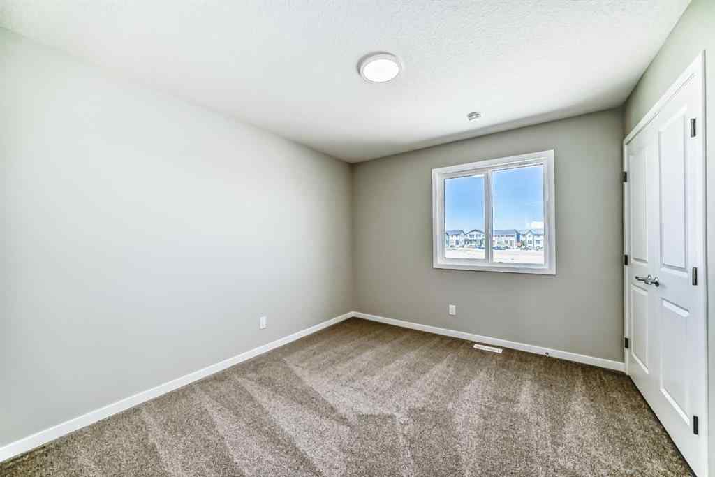 MLS® A2187732 - 148 Hotchkiss Common SE in Hotchkiss Calgary, Residential