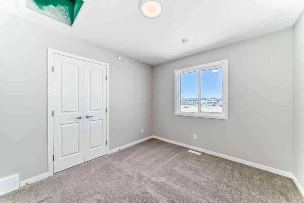 MLS® A2187732 - 148 Hotchkiss Common SE in Hotchkiss Calgary, Residential