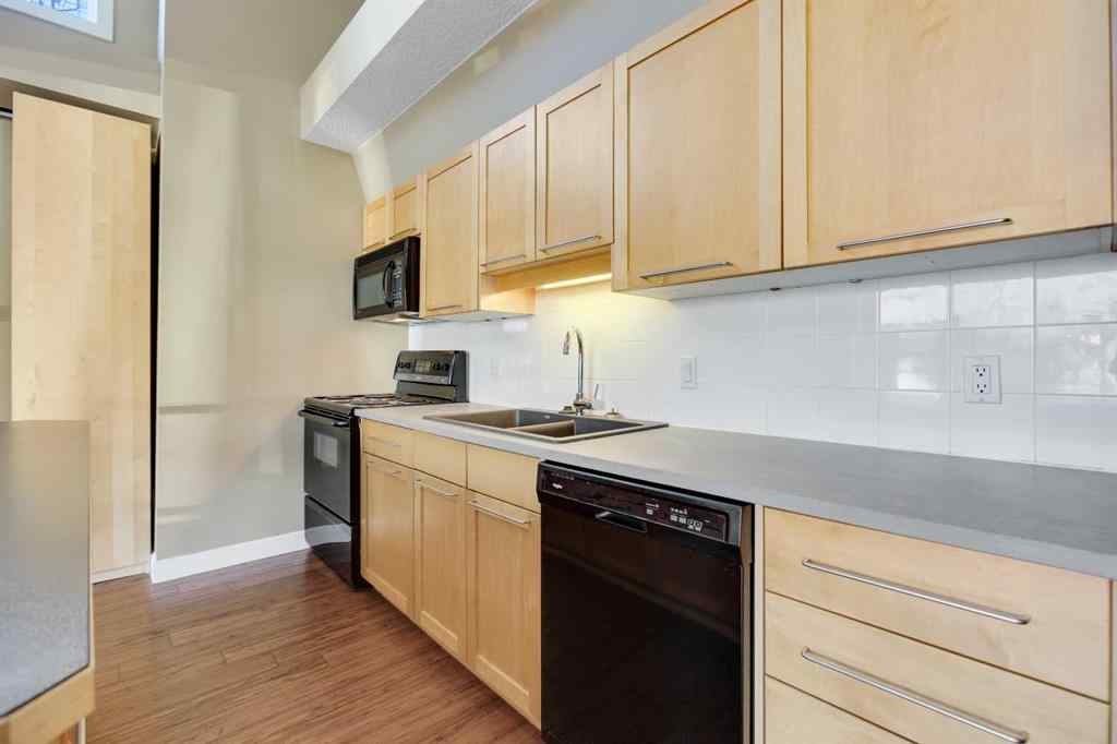 MLS® A2187864 - Unit #111 1505 27 Avenue SW in South Calgary Calgary, Residential