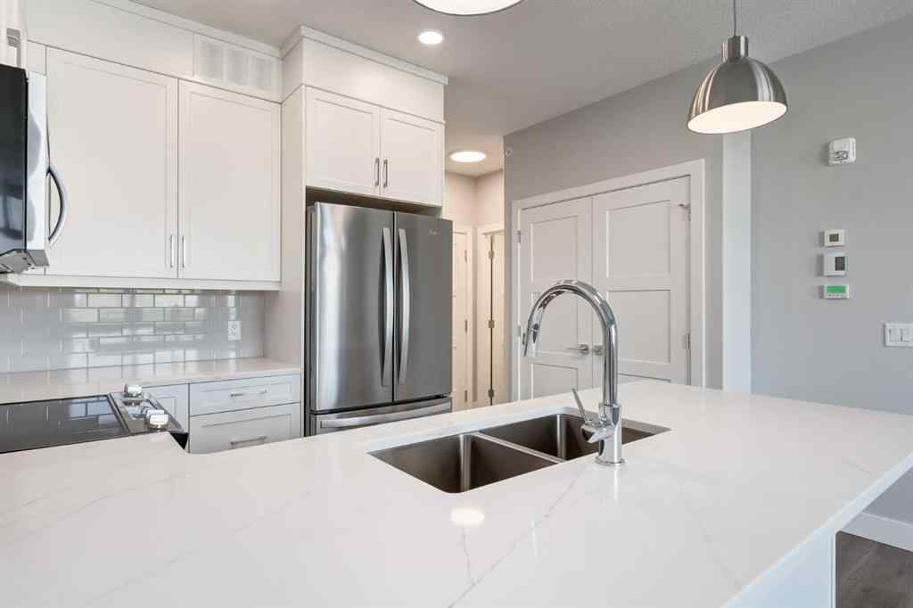MLS® A2189418 - Unit #210 175 Wolf Hollow Crescent SE in Wolf Willow Calgary, Residential