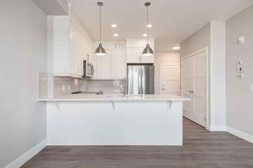 MLS® A2189418 - Unit #210 175 Wolf Hollow Crescent SE in Wolf Willow Calgary, Residential