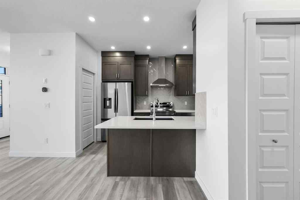 MLS® A2189764 - 1031 Bayview Crescent SW in Bayview Airdrie, Residential