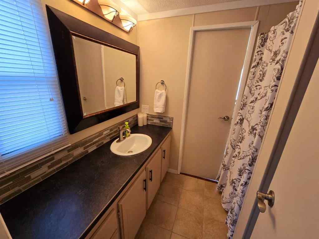MLS® A2191395 - Unit ##61 1410 43 Street S in Redwood Lethbridge, Mobile
