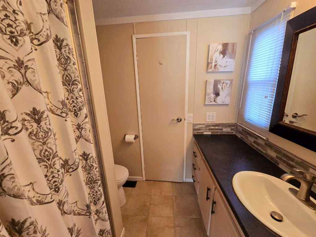 MLS® A2191395 - Unit ##61 1410 43 Street S in Redwood Lethbridge, Mobile