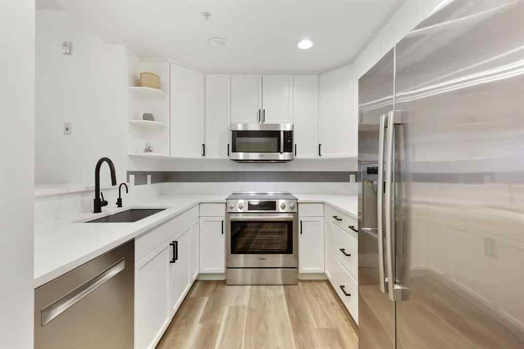 MLS® A2191744 - Unit #708 1718 14 Avenue NW in Hounsfield Heights/Briar Hill Calgary, Residential